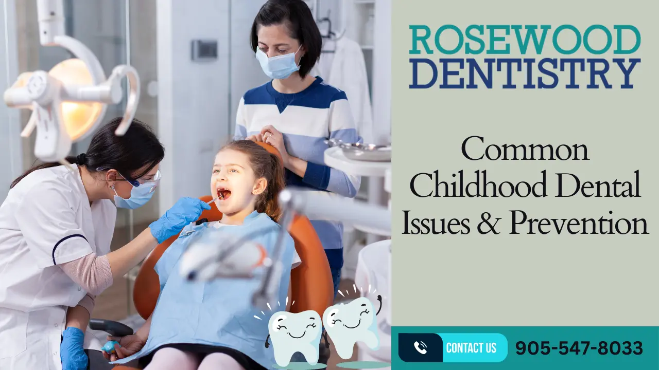 The image shows a young girl patient having a dental examination or procedure performed by two dental professionals wearing masks and medical attire. They are working inside what appears to be a dentist's office or clinic, with dental equipment and branding for "Rosewood Dentistry" visible. The scene depicts routine pediatric dental care in a professional healthcare setting.
